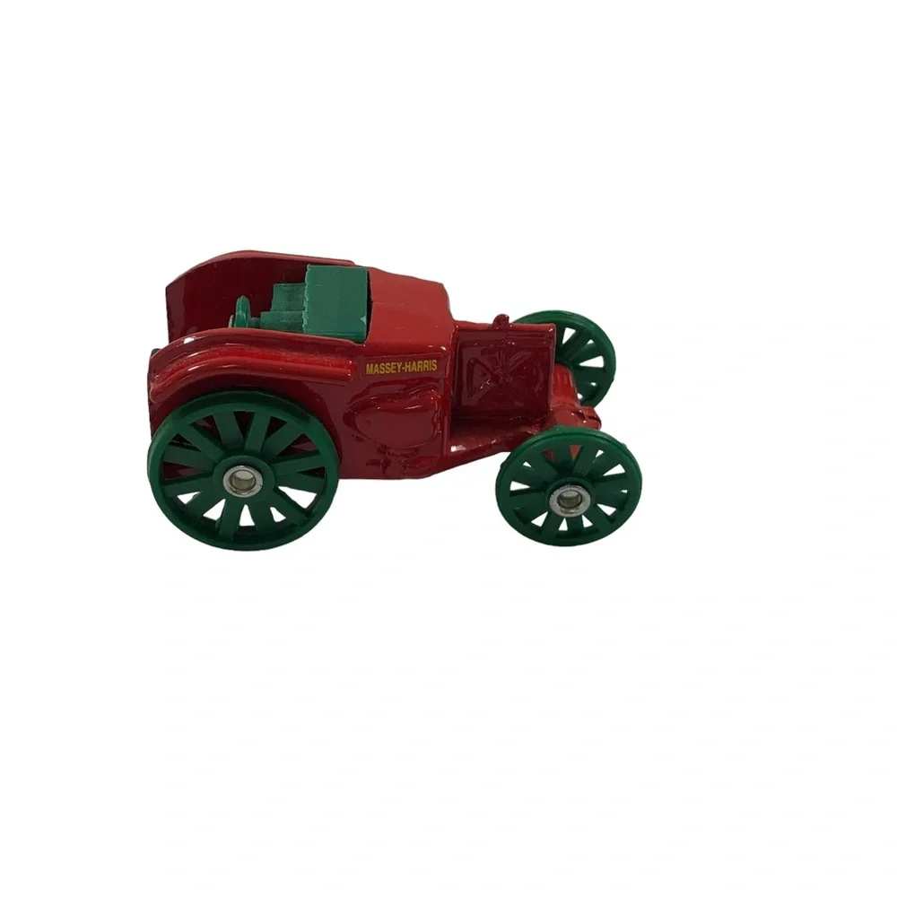 Vintage Mini Die-cast Steel Wheel Massy Harris Car.